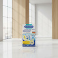 A box of Dr. Beckmann Washing Machine Hygiene Cleaner shown against a light gray background with a hand silhouette behind it and a vertical measurement marker reading 5.