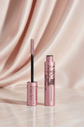 Maybelline Sensational Sky mascara with pink packaging on a white background