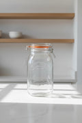 Clear glass jar with airtight lid on a white background, featuring the Kilner brand.