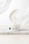 Nivea Q10 Anti-Wrinkle Day Care cream jar on a yellow background