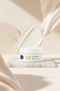 Nivea Q10 Anti-Wrinkle Day Cream jar on a yellow background