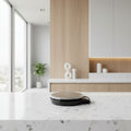 Digital kitchen scale with a clear lid on a white background