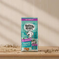 Barking Heads dog food package on a blue background