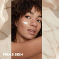 Woman with a skincare product on her face, with text 'Firms Skin' below.