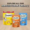 Three Dreamies cat treat packages on a yellow background with text 'Explore all our irresistible treats'.