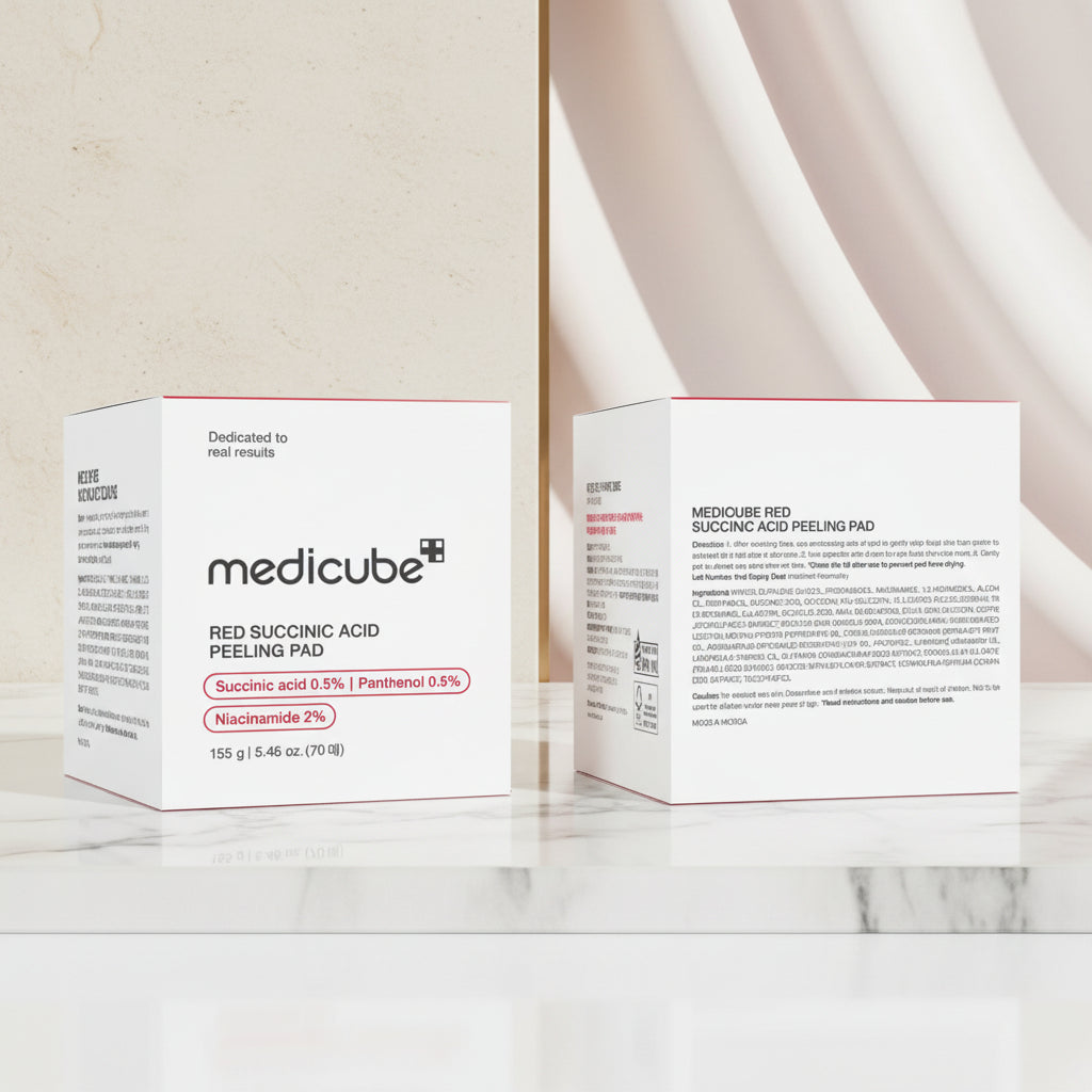 Two boxes of Medicube Red Succinic Acid Peeling Pad on a white background