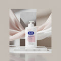 A white bottle of E45 Lotion with a pump dispenser, featuring a blue and pink label on a clean white background.
