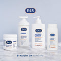 Collection of E45 skincare products on a light gray background