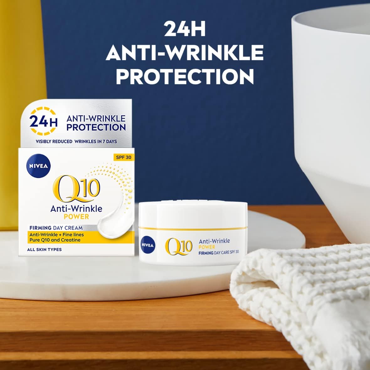 Nivea Q10 anti-wrinkle cream packaging on a wooden surface with a blue background.