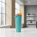 Colorful tumbler with a multicolored lid on a white background