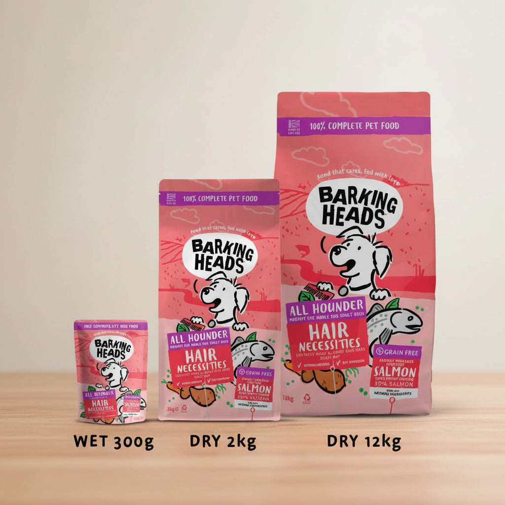 Three bags of Barking Heads Hair Necessities dry dog food in wet 300g, dry 2kg, and dry 12kg sizes, displayed against a pink background with promotional text.