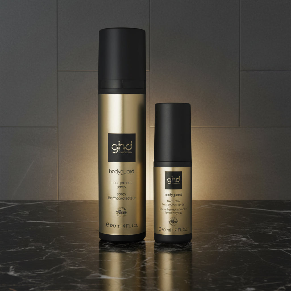 Two ghd bodyguard hair care products on a white background