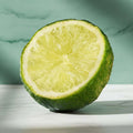 Half-cut lime on a blue background