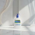 Cetaphil Gentle Skin Cleanser bottle with pump on a white background