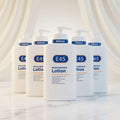 Multiple bottles of E45 moisturising lotion on a white background