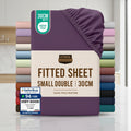 Stack of Utopia Bedding fitted sheets with a purple sheet on top, displayed against a white background.