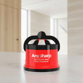 A red and black Any Sharp knife sharpener with white text on the front, shown on a solid white background.