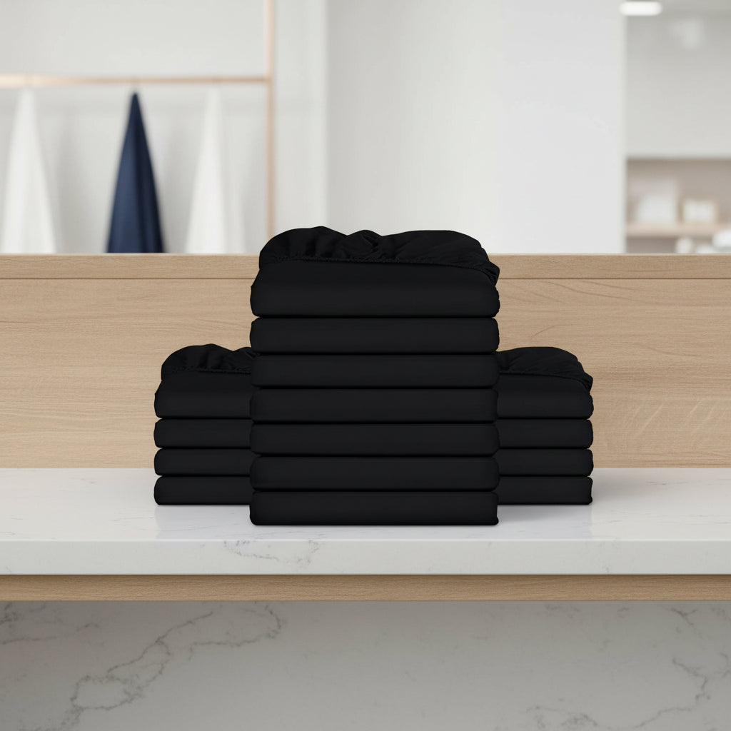 Stack of burgundy folded towels on a white background