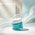 Neutrogena Hydro Boost water gel jar with text about moisturizing on a blue and white background
