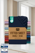 Stack of Utopia Bedding fitted sheets with a navy blue sheet on top and color swatches below.