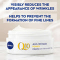 Nivea Q10 Anti-Wrinkle Power Firming Day Cream jar with text on a white background