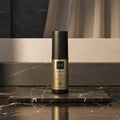 ghd heat protect spray bottle with text on a white background