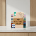Stack of Utopia Bedding fitted sheets with color options and product details on a beige background.