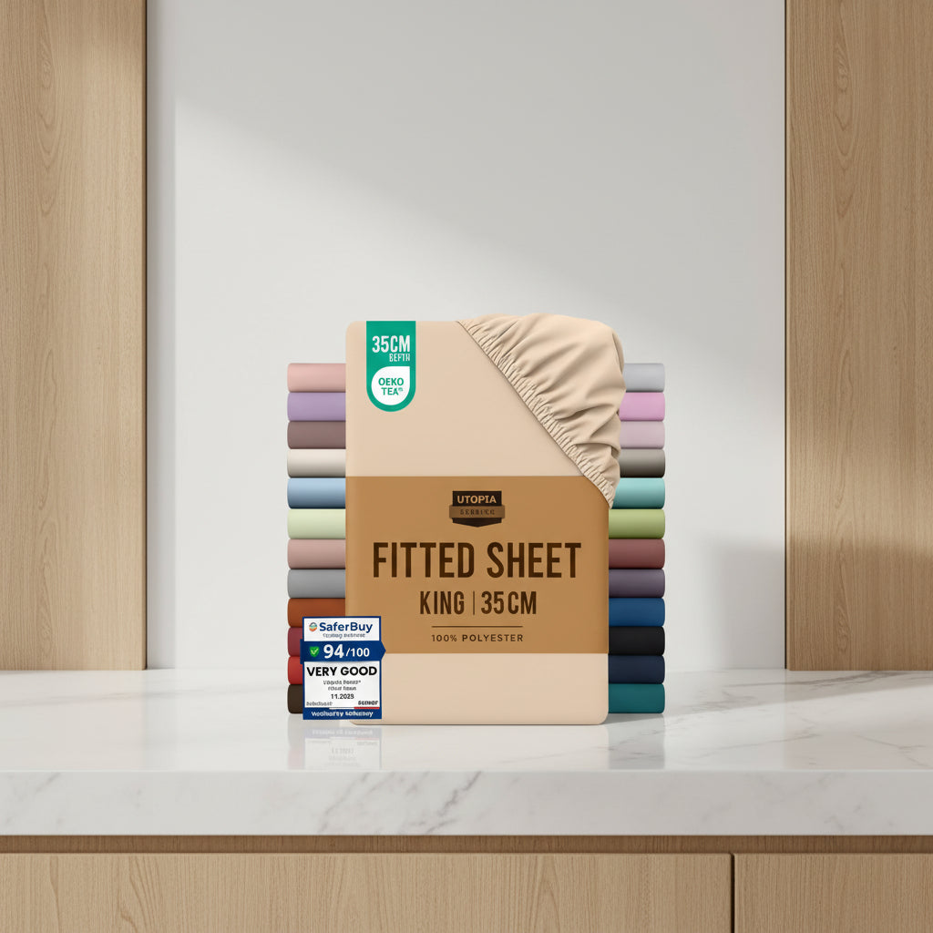 Stack of Utopia Bedding fitted sheets with color options and product details on a beige background.
