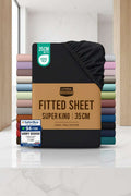 Packaged fitted sheet with color swatches and branding on a white background