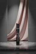 Maybelline Tonal Cosmetics Black + Blue mascara tube in black with pink lettering and star details.
