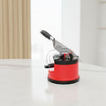 Red knife sharpener with a knife inserted, branded 'AnySharp', on a white background.