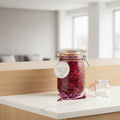 Jar of pickled red cabbage with a label on a wooden surface