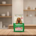 Harringtons dog food package with a dog's face on the front, featuring salmon and potato ingredients.