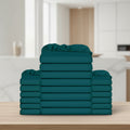 Stack of teal folded towels on a white background