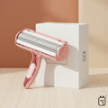 Pet hair removal roller with ACE2ACE branding and packaging on a light green background.