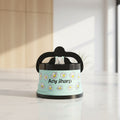 A cylindrical sharpening steel holder with a mint green body decorated with white daisy flowers and the text 'Any Sharp' in black. It features a black handle and a black top base, shown on a plain white background.