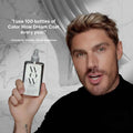Man holding a bottle of Color Wow Dream Coat with a quote from a celebrity stylist on a gray background