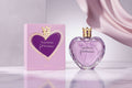 Vera Wang Princess perfume bottle and packaging with a heart design.