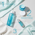 Neutrogena skincare products with 'Cleanse', 'Moisturise', and 'Illuminate' steps on a blue and gray background.