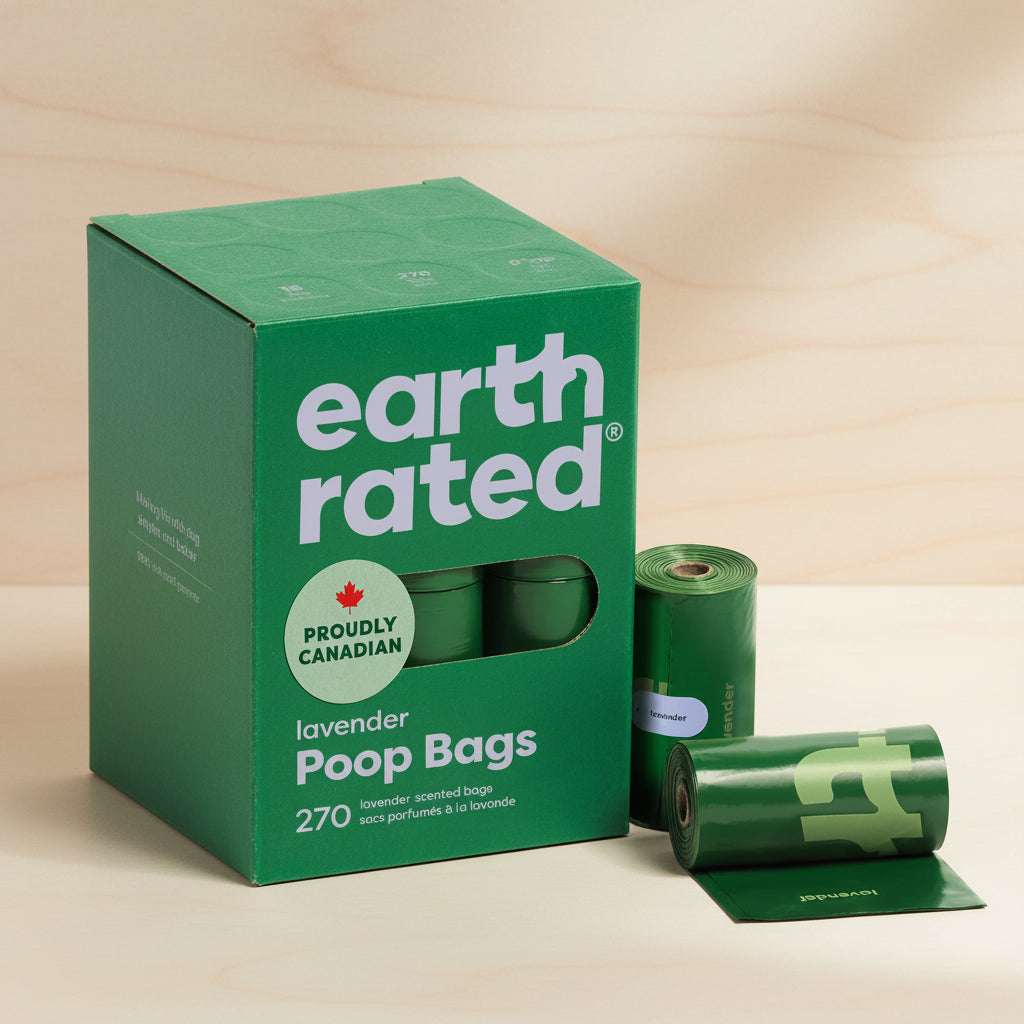 Green box of earth rated lavender poop bags with a roll on a white background
