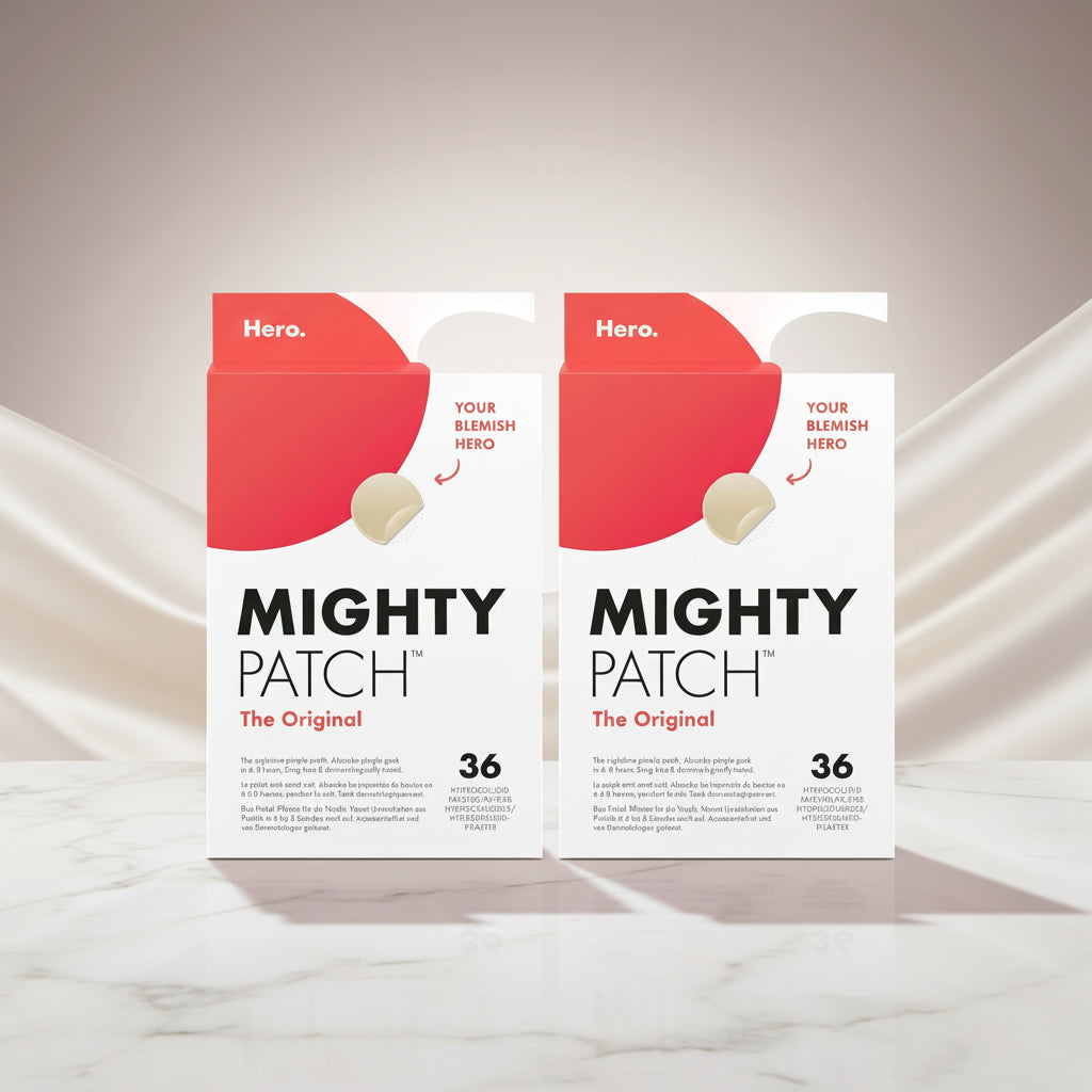 Two identical boxes of Mighty Patch The Original hydrocolloid patch pack shown side by side on a white background. The packaging features a red top flap with a beige patch illustration and text reading 'Hero.