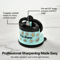 A light blue and black Any Sharp portable kitchen sharpener with a daisy pattern, shown on a white marble background with text callouts explaining its tungsten carbide edges and pre-set angle.