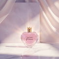 Vera Wang Princess perfume bottle on a purple background