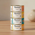 Stack of Applaws cat food tins with labels on a white background