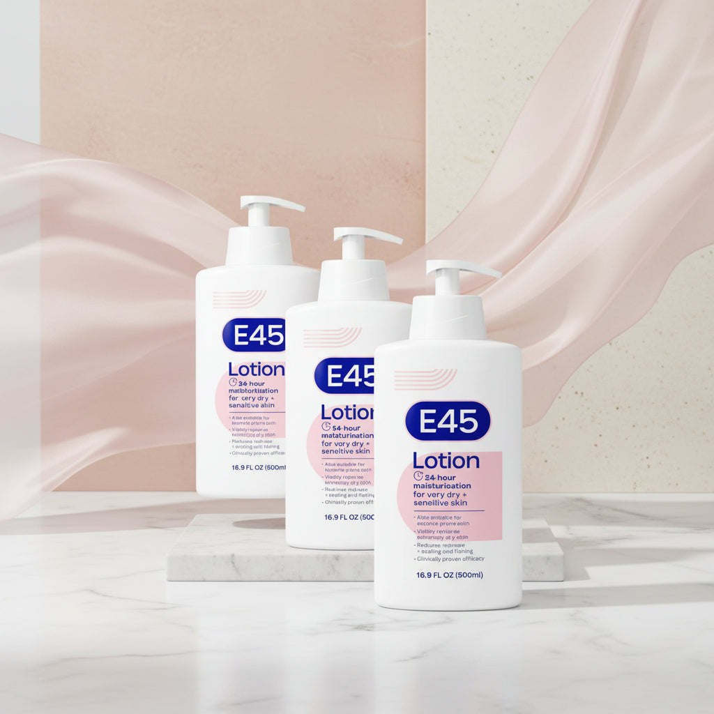 Three white pump bottles of E45 Lotion arranged in a fan shape on a plain white background. The bottles feature blue and pink labels with text indicating 24-hour moisturisation for very dry + sensitive skin.