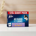 Purina Felix 120x Giant Pack box for Favourites Selection In Jelly cat litter. The packaging features a dark blue background with a red banner at the top, white text, and a cartoon cat peeking out from a cardboard tube on the right.