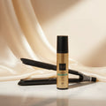 GHD Chronos hair protection system bundle featuring a black flat iron, a gold and black body spray bottle, and a gold and black Chronos bottle, with Italian promotional text and a Heat Protection System logo on a white background.