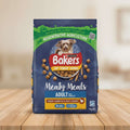 Bakers dog food package held by a person to show size