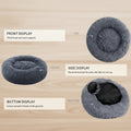 Gray donut pet bed with labeled features on a white background