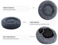 Gray donut pet bed with labeled features on a white background